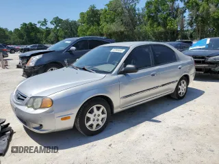 2004 Kia Spectra GS with VIN KNAFB161945141309, listed as a Copart auction lot 52395445 with 99,100 mi miles and Clean Title. Bid and sale history available at DreamBid. Image 1.