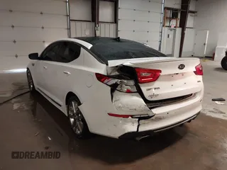 2015 Kia Optima SXL Turbo with VIN 5XXGR4A67FG395283, listed as a IAAI auction lot 41277314 with 171,473 mi miles and . Bid and sale history available at DreamBid. Image 3.