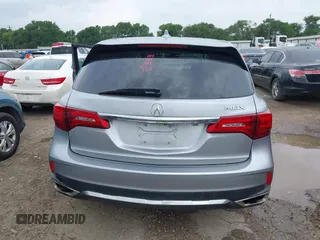 2020 Acura MDX with VIN 5J8YD3H32LL016504, listed as a IAAI auction lot 42126961 with 90,307 mi miles and . Bid and sale history available at DreamBid. Image 17.
