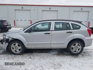 2007 Dodge Caliber SXT with VIN 1B3HB48B07D159549, listed as a IAAI auction lot 41330969 with 124,911 mi miles and . Bid and sale history available at DreamBid. Image 14.