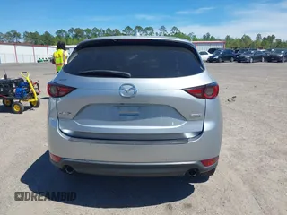 2019 Mazda CX-5 Grand Touring with VIN JM3KFADM1K1606082, listed as a IAAI auction lot 41875878 with 66,089 mi miles. Bid and sale history available at carsss.com. Image 16.