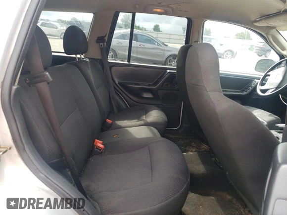 2004 Jeep Grand Cherokee Laredo z VIN 1J4GW48S14C288605, wystawiony jako Copart lot #60204815 z przebiegiem 247 816 mil mil oraz Szkoda całkowita • Salvage title. Historia ofert i sprzedaży dostępna na DreamBid. Obrazek 11.