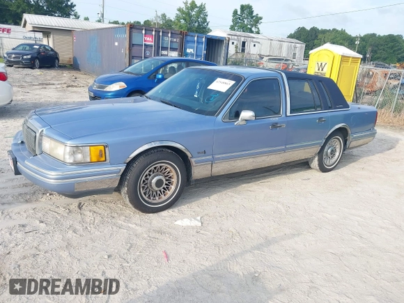1994 Lincoln Town Car Executive with VIN 1LNLM81W5RY745596, listed as a IAAI auction lot 42548865 with 380,567 mi miles and . Bid and sale history available at DreamBid. Image 2.