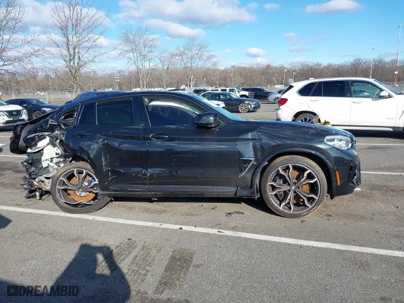 2020 BMW X4 M Competition with VIN 5YMUJ0C08LLA99688, listed as a IAAI auction lot 41226234 with 63,497 mi miles. Bid and sale history available at carsss.com. Image 12.