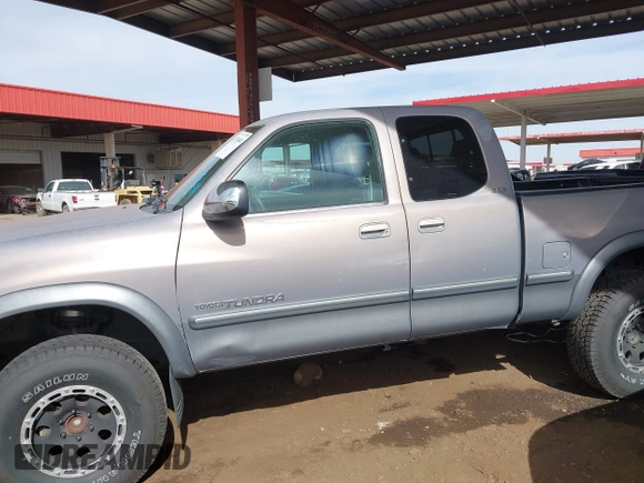 2000 Toyota Tundra SR5 with VIN 5TBRN3415YS049029, listed as a IAAI auction lot 41731441 with 202,100 mi miles and . Bid and sale history available at DreamBid. Image 14.