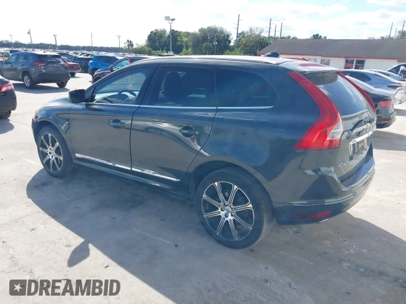 2015 Volvo XC60 T5 Drive-E Premier Plus with VIN YV440MDC7F2606774, listed as a IAAI auction lot 41564034 with 166,758 mi miles. Bid and sale history available at carsss.com. Image 3.