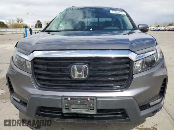 2023 Honda Ridgeline RTL-E with VIN 5FPYK3F78PB010961, listed as a Copart auction lot 51458635 with 33,508 mi miles and Salvage title. Bid and sale history available at DreamBid. Image 5.