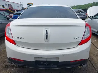 2013 Lincoln MKS with VIN 1LNHL9DK6DG600928, listed as a IAAI auction lot 42502424 with 194,015 mi miles and . Bid and sale history available at DreamBid. Image 16.