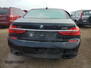 2019 BMW 7 Series 740i xDrive z VIN WBA7E4C50KGV28241, wystawiony jako Copart lot #87329774 z przebiegiem Nie podano mil oraz Szkoda całkowita • Salvage title. Historia ofert i sprzedaży dostępna na DreamBid. Obrazek 6.