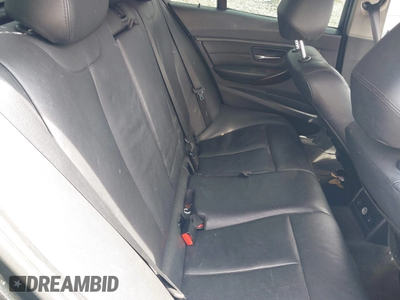 2013 BMW 3 Series 328i xDrive with VIN WBA3B5C53DF591002, listed as a IAAI auction lot 38877599 with 136,098 mi miles and . Bid and sale history available at DreamBid. Image 8.
