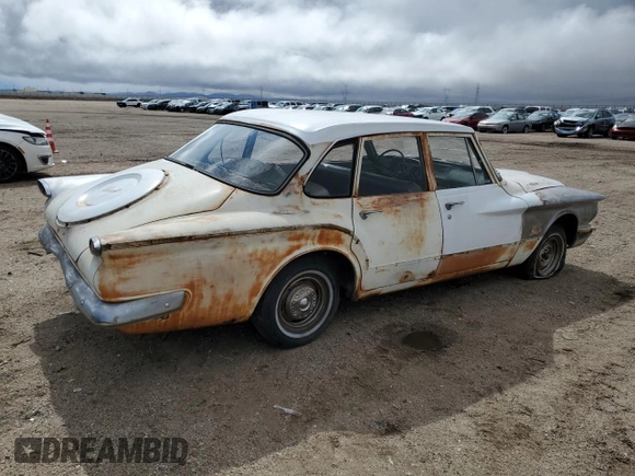 1960 Plymouth Valiant z VIN 1307117456, wystawiony jako Copart lot #48976045 z przebiegiem 20 241 mil mil oraz Czysty tytuł • Clean title. Historia ofert i sprzedaży dostępna na DreamBid. Obrazek 3.