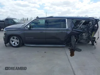 2015 Chevrolet Suburban LTZ with VIN 1GNSCKKC9FR500933, listed as a IAAI auction lot 41830980 with 169,217 mi miles and . Bid and sale history available at DreamBid. Image 13.