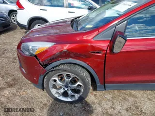 2016 Ford Escape Titanium with VIN 1FMCU9J9XGUC71696, listed as a IAAI auction lot 41651168 with 108,856 mi miles. Bid and sale history available at carsss.com. Image 6.