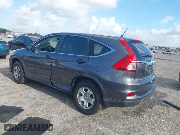 2015 Honda CR-V LX with VIN 2HKRM3H34FH510312, listed as a IAAI auction lot 41952816 with 111,712 mi miles and . Bid and sale history available at carsss.com. Image 3.