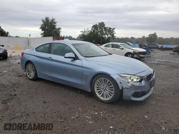 2014 BMW 4 Series 428i xDrive with VIN WBA3N9C59EF721686, listed as a Copart auction lot 63375275 with 192,314 mi miles and Clean title. Bid and sale history available at DreamBid. Image 4.