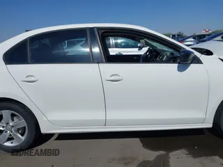 2012 Volkswagen Jetta S z VIN 3VW1K7AJ2CM331367, wystawiony jako IAAI lot #42294252 z przebiegiem 162 373 mil mil oraz . Historia ofert i sprzedaży dostępna na DreamBid. Obrazek 14.