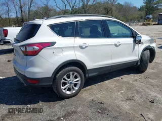 2017 Ford Escape SE with VIN 1FMCU0GD1HUA87904, listed as a IAAI auction lot 41790108 with 103,656 mi miles. Bid and sale history available at carsss.com. Image 4.