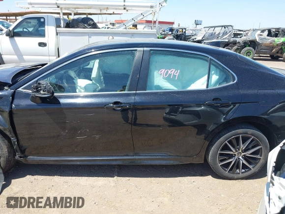 2023 Toyota Camry SE with VIN 4T1G11AK1PU800063, listed as a IAAI auction lot 42121633 with 41,572 mi miles. Bid and sale history available at carsss.com. Image 14.