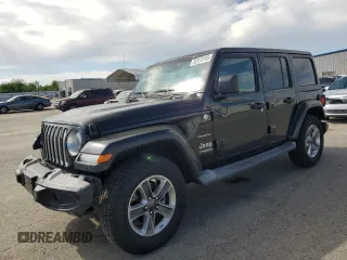 2019 Jeep Wrangler Unlimited Sahara with VIN 1C4HJXEN0KW588687, listed as a Copart auction lot 52812895 with 91,486 mi miles and Salvage title. Bid and sale history available at DreamBid. Image 1.