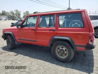 1996 Jeep Cherokee SE with VIN 1J4FT28S3TL213153, listed as a Copart auction lot 57217625 with 331,741 mi miles and Salvage title. Bid and sale history available at DreamBid. Image 2.