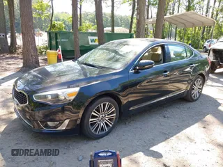 2015 Kia Cadenza Premium z VIN KNALN4D77F5177893, wystawiony jako IAAI lot #42261570 z przebiegiem 107 396 mil mil oraz . Historia ofert i sprzedaży dostępna na DreamBid. Obrazek 2.