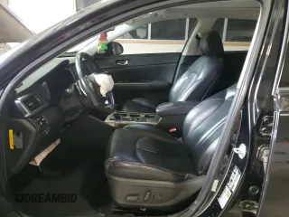 2016 Kia Optima SX Turbo with VIN 5XXGW4L23GG011780, listed as a Copart auction lot 56628295 with 104,288 mi miles and Salvage title. Bid and sale history available at DreamBid. Image 7.