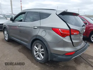 2013 Hyundai Santa Fe Sport z VIN 5XYZU3LA4DG085412, wystawiony jako IAAI lot #42016302 z przebiegiem 121 484 mil mil oraz . Historia ofert i sprzedaży dostępna na DreamBid. Obrazek 3.