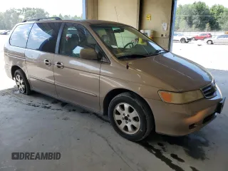 2003 Honda Odyssey EX-L with VIN 5FNRL18963B087397, listed as a Copart auction lot 62392415 with 261,737 mi miles and Salvage title. Bid and sale history available at DreamBid. Image 4.