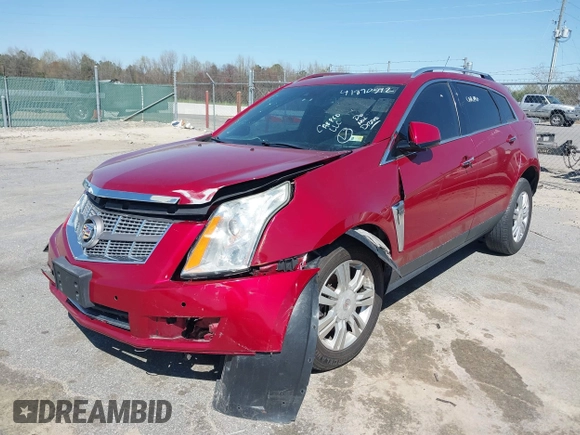 2015 Cadillac SRX Luxury Collection with VIN 3GYFNEE32FS539971, listed as a IAAI auction lot 41890592 with 90,843 mi miles. Bid and sale history available at carsss.com. Image 22.