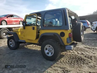 2001 Jeep Wrangler Sport with VIN 1J4FA49S21P312522, listed as a Copart auction lot 54698935 with 201,199 mi miles and Salvage Title. Bid and sale history available at carsss.com. Image 2.