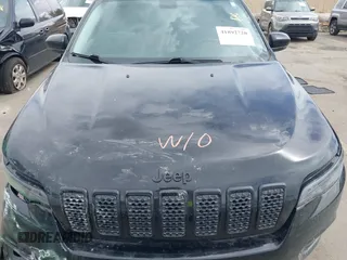 2020 Jeep Cherokee Altitude with VIN 1C4PJMLX9LD634920, listed as a IAAI auction lot 41892720 with 75,388 mi miles and . Bid and sale history available at DreamBid. Image 10.