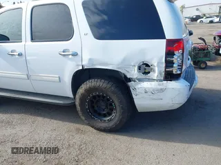 2011 Chevrolet Tahoe LT with VIN 1GNSCBE0XBR374156, listed as a IAAI auction lot 42659337 with 201,514 mi miles and . Bid and sale history available at DreamBid. Image 6.