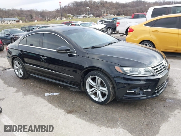 2014 Volkswagen CC R-Line with VIN WVWBN7ANXEE521055, listed as a IAAI auction lot 41197539 with 94,902 mi miles. Bid and sale history available at carsss.com. Image 1.