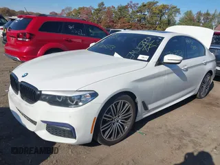 2018 BMW 5 Series 530i xDrive with VIN WBAJA7C58JG907988, listed as a IAAI auction lot 38011708 with Not provided miles and . Bid and sale history available at DreamBid. Image 16.