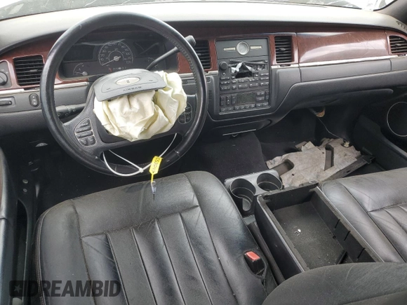 2003 Lincoln Town Car Executive z VIN 1LNHM81W33Y653643, wystawiony jako Copart lot #58824145 z przebiegiem Nie podano mil oraz Szkoda całkowita • Salvage title. Historia ofert i sprzedaży dostępna na DreamBid. Obrazek 8.