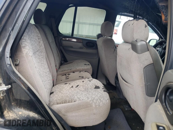 2004 Isuzu Ascender S с VIN 4NUDT13S142102630, выставлен на аукционе Copart как лот 61292895 с пробегом Не указан миль и Списание • Salvage title. История ставок и продаж доступна на DreamBid. Изображение 11.