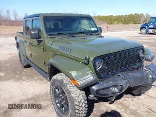 2024 Jeep Gladiator Sport S with VIN 1C6HJTAG0RL101619, listed as a IAAI auction lot 41817096 with 6,719 mi miles and . Bid and sale history available at DreamBid. Image 1.
