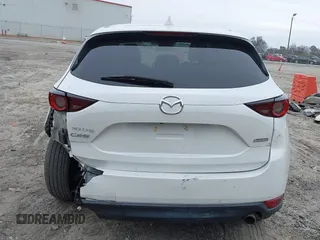 2017 Mazda CX-5 Touring with VIN JM3KFACL8H0205717, listed as a IAAI auction lot 41173725 with 107,604 mi miles. Bid and sale history available at carsss.com. Image 16.