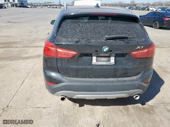 2018 BMW X1 sDrive28i with VIN WBXHU7C31J5H39068, listed as a Copart auction lot 49018985 with 100,611 mi miles and Salvage Title. Bid and sale history available at carsss.com. Image 6.