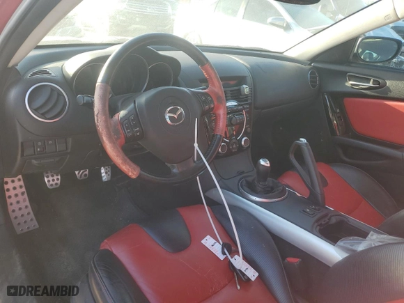 2004 Mazda RX-8 with VIN JM1FE173240134256, listed as a Copart auction lot 74485554 with 126,992 mi miles and Clean Title. Bid and sale history available at carsss.com. Image 8.