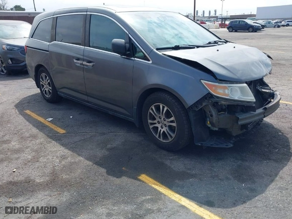 2011 Honda Odyssey EX-L with VIN 5FNRL5H63BB068205, listed as a IAAI auction lot 42034057 with 106,443 mi miles. Bid and sale history available at carsss.com. Image 1.