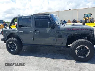 2019 Jeep Wrangler Unlimited Rubicon with VIN 1C4HJXFN9KW507281, listed as a IAAI auction lot 42695939 with 60,802 mi miles and . Bid and sale history available at DreamBid. Image 14.