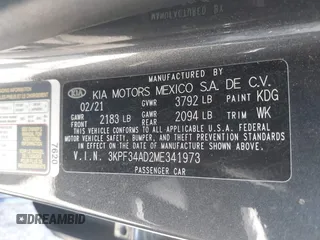 2021 Kia Forte GT-Line z VIN 3KPF34AD2ME341973, wystawiony jako IAAI lot #42084462 z przebiegiem 61 542 mil mil oraz . Historia ofert i sprzedaży dostępna na DreamBid. Obrazek 9.