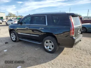 2018 Cadillac Escalade Luxury with VIN 1GYS3BKJXJR348574, listed as a Copart auction lot 81994574 with 143,867 mi miles and Salvage title. Bid and sale history available at DreamBid. Image 2.
