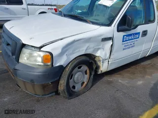 2007 Ford F-150 XL with VIN 1FTRF12W17NA26892, listed as a IAAI auction lot 41011688 with 158,088 mi miles. Bid and sale history available at carsss.com. Image 6.