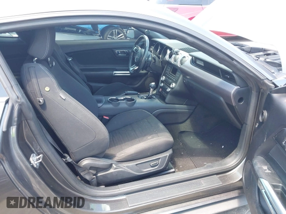 2015 Ford Mustang EcoBoost z VIN 1FA6P8TH5F5351476, wystawiony jako IAAI lot #42157688 z przebiegiem 134 131 mil mil oraz . Historia ofert i sprzedaży dostępna na DreamBid. Obrazek 5.