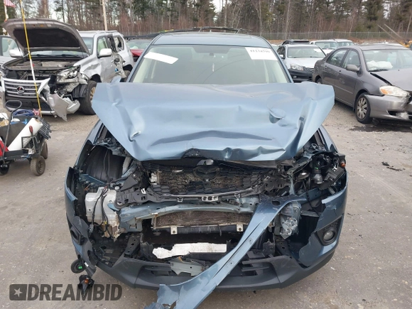 2015 Mazda CX-5 Touring with VIN JM3KE4CY1F0545305, listed as a IAAI auction lot 41234599 with 92,791 mi miles. Bid and sale history available at carsss.com. Image 12.