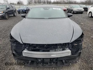 2024 Audi RS e-tron GT z VIN WAUBHBFWXR7901726, wystawiony jako Copart lot #47284335 z przebiegiem 5068 mil mil oraz Szkody całkowita. Historia ofert i sprzedaży dostępna na DreamBid. Obrazek 5.