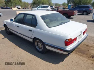 1994 BMW 7 Series z VIN WBAGD4324RDE65491, wystawiony jako IAAI lot #42761773 z przebiegiem 141 762 mil mil oraz . Historia ofert i sprzedaży dostępna na DreamBid. Obrazek 3.