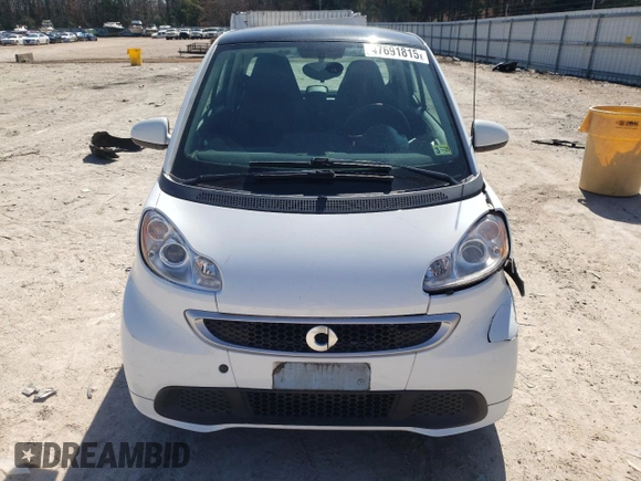 2014 Smart fortwo Pure с VIN WMEEJ3BA0EK780282, выставлен на аукционе Copart как лот 47691815 с пробегом 74 144 миль миль и Чистый • Clean title. История ставок и продаж доступна на DreamBid. Изображение 5.